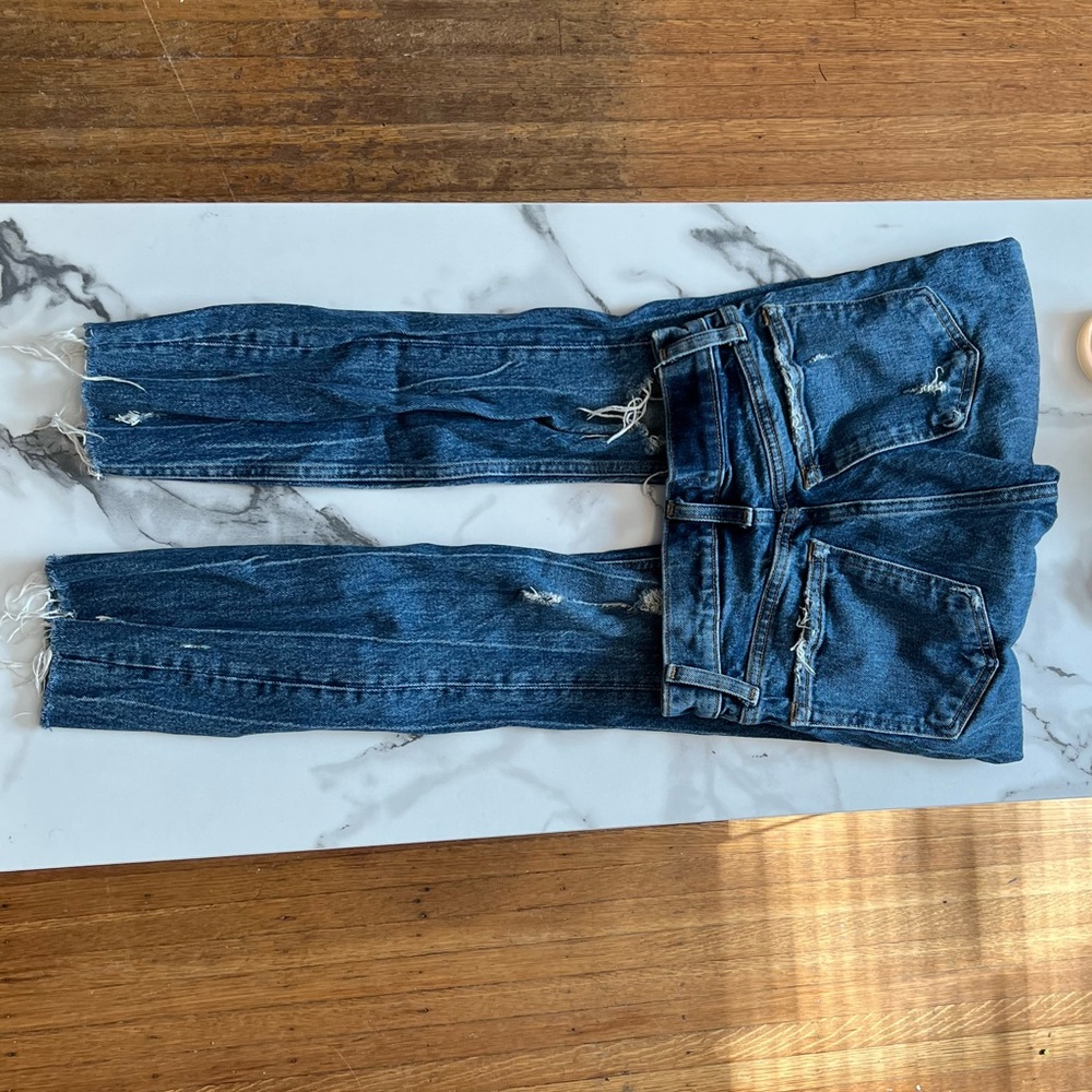 Ripped blue jeans